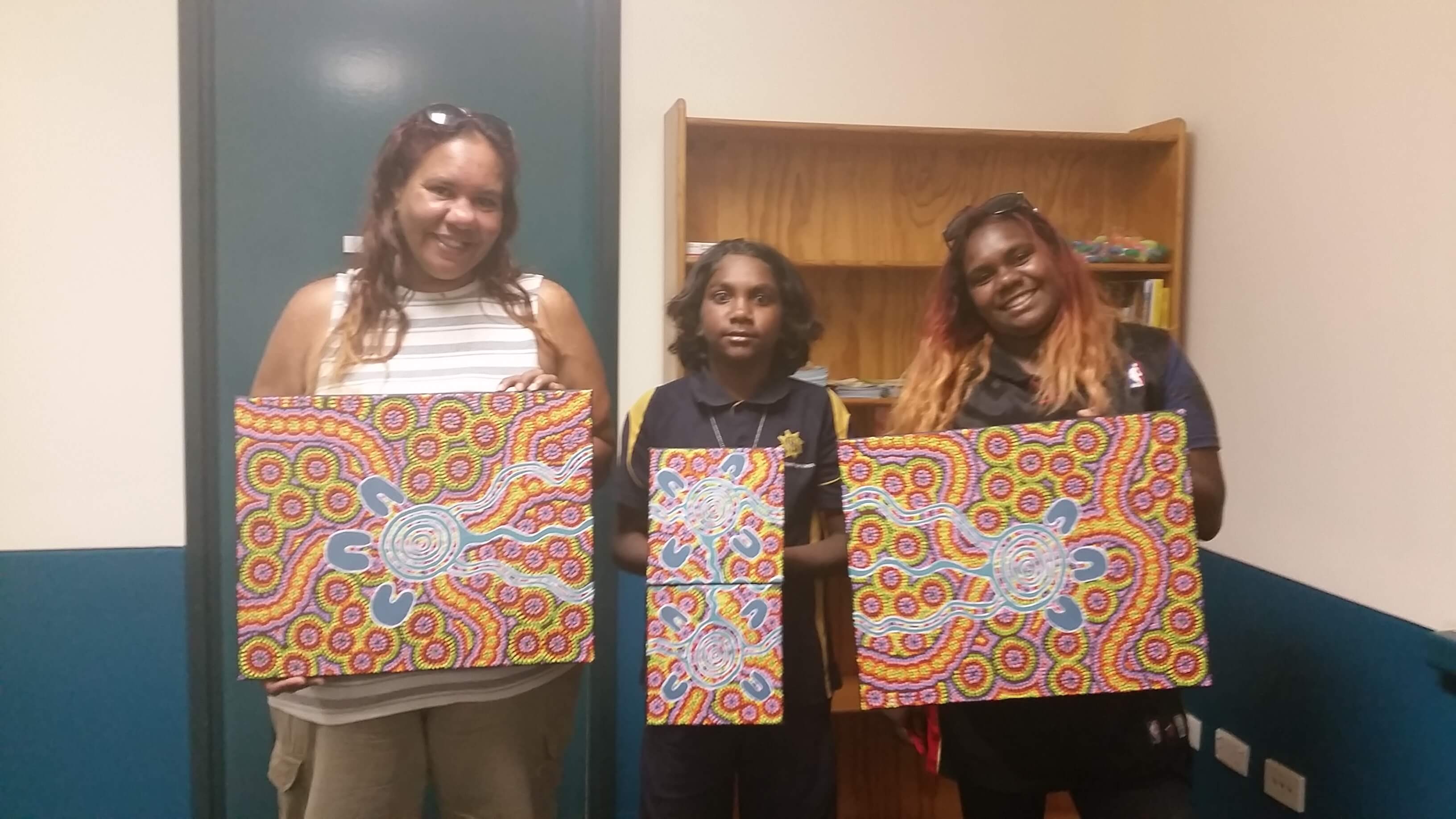 South Hedland-based artists Annabella Flatt and her child creating artwork for HelpingMinds®