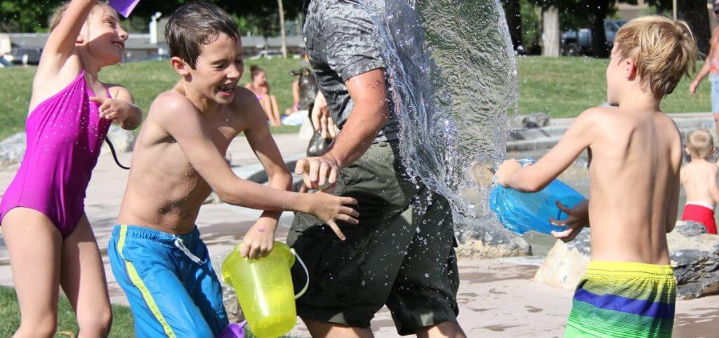 Kids enjoying their day at a waterpark for school holiday camps