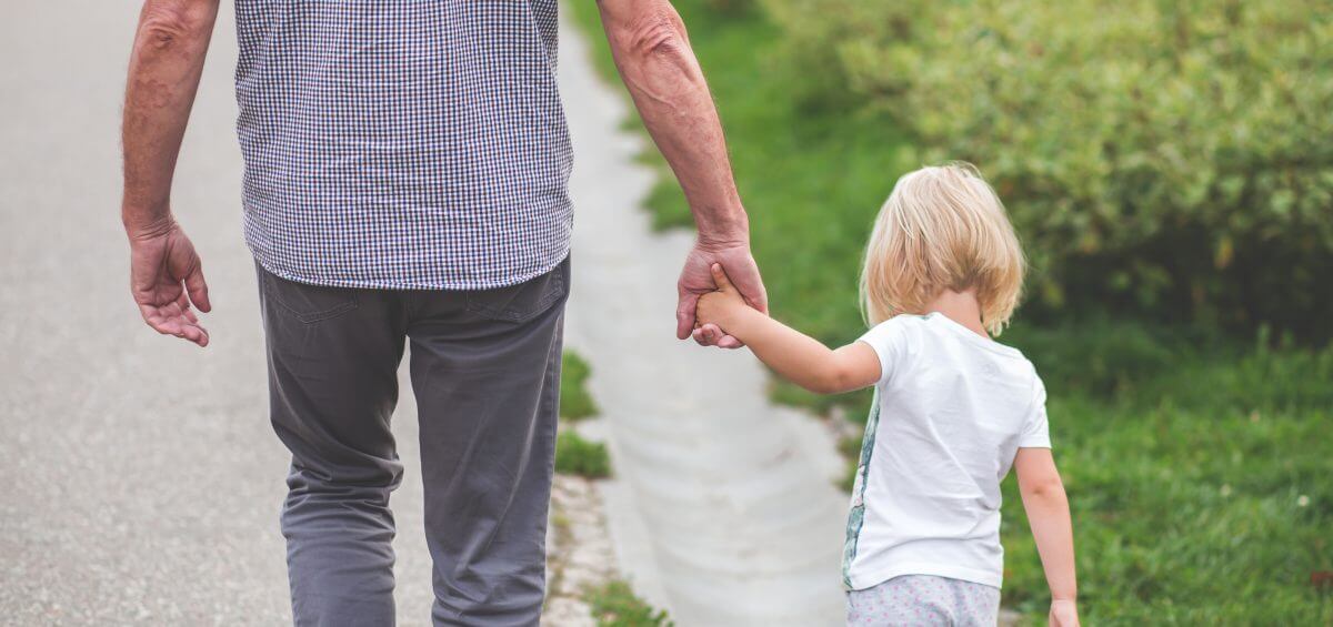 Raising Resilient Children Father holding his daughter's hand for raising resilient children header